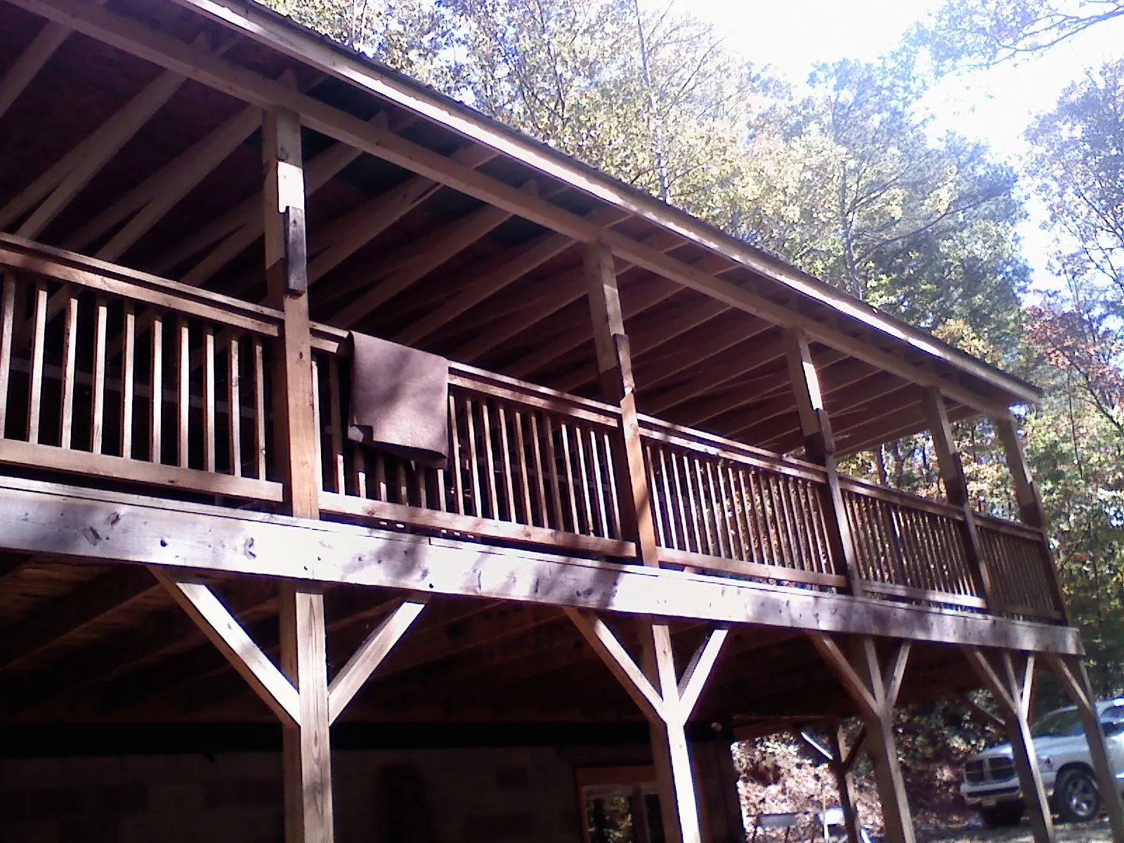 Timber framing under a new elevated porch and deck — Roof Leak Repair in Tenmile by Roofing Brothers
